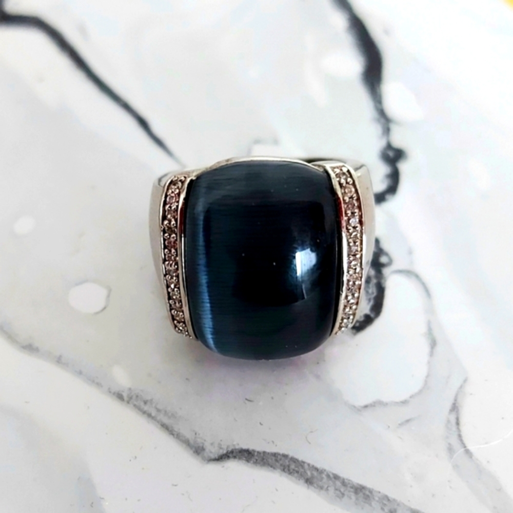 Beautiful Cocktail Rhodium Plated Silver Ring With Black Stone and CZ Accents.